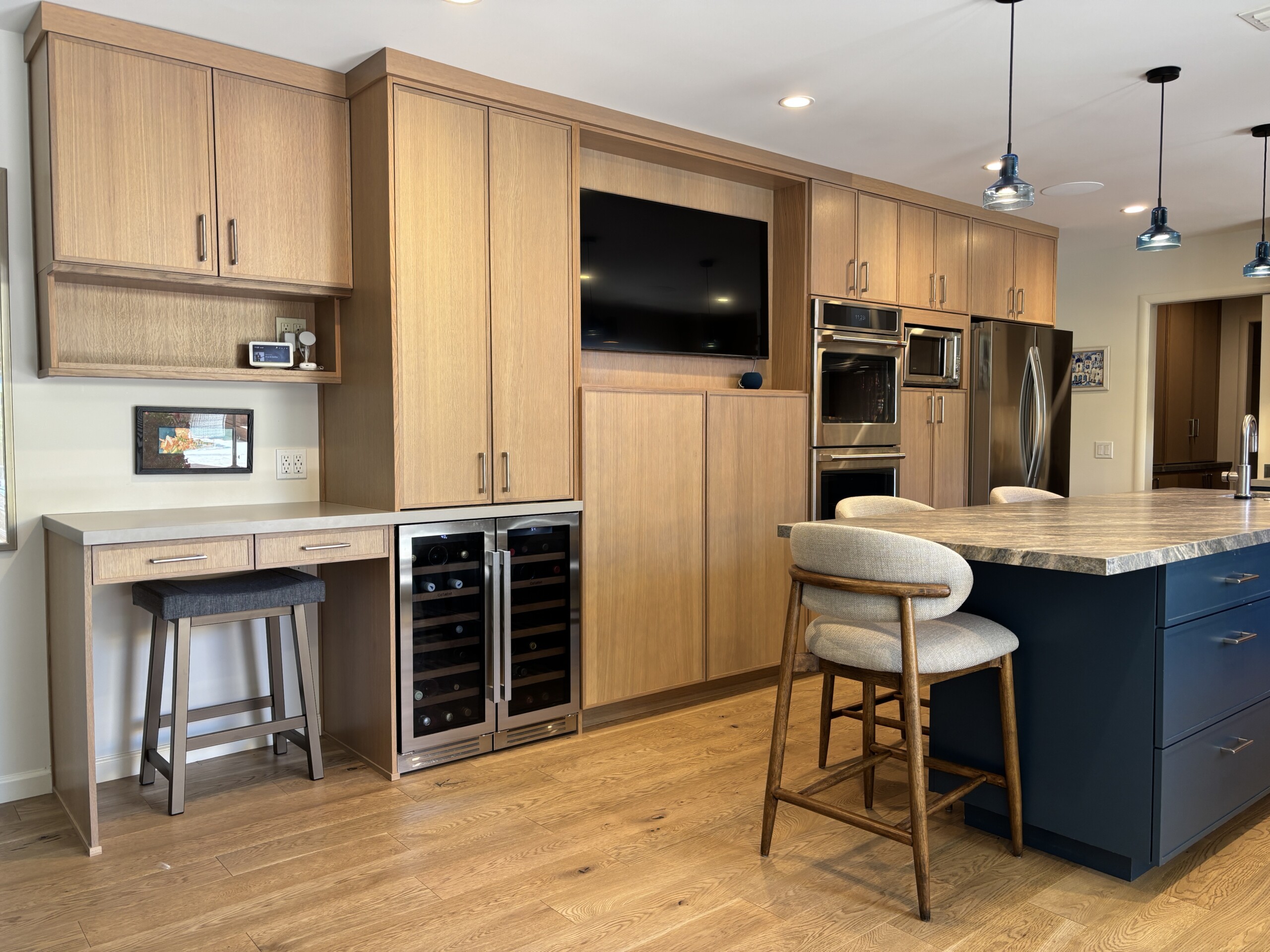 Kitchen with wine refrigerator and TV Cabinet