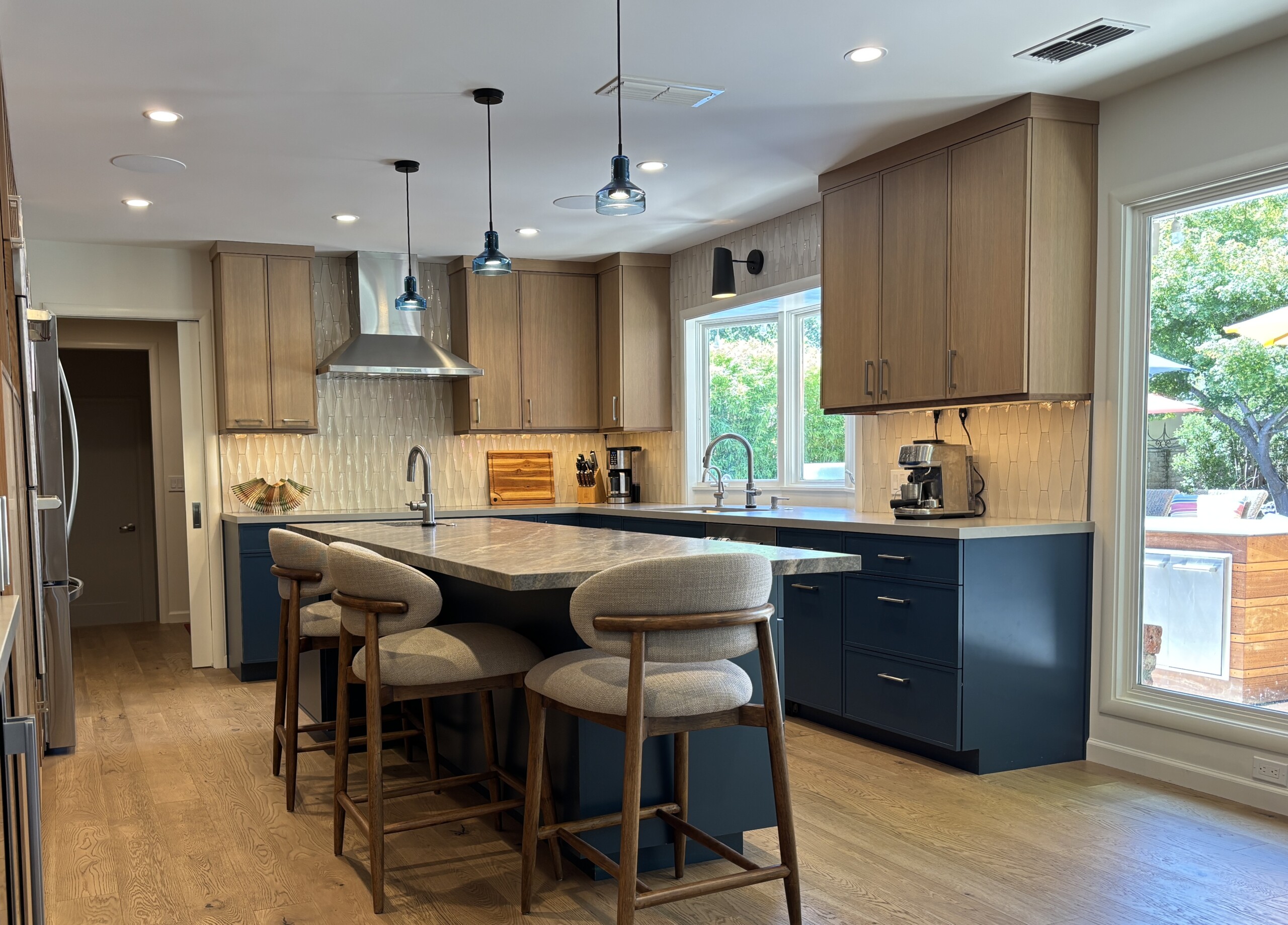 Kitchen with grey slab range windows